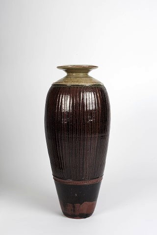 Appraisal: Richard Batterham British b Monumental vaseash and tenmoku glaze fluted