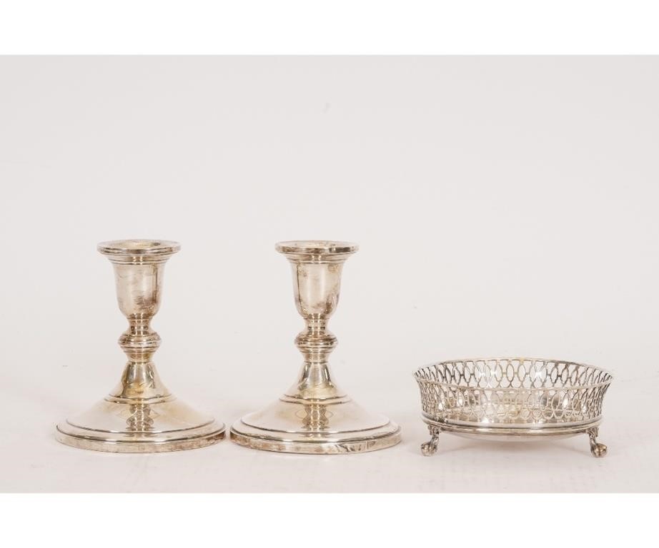 Appraisal: Sterling silver to inlcude two weighted candlesticks h and a