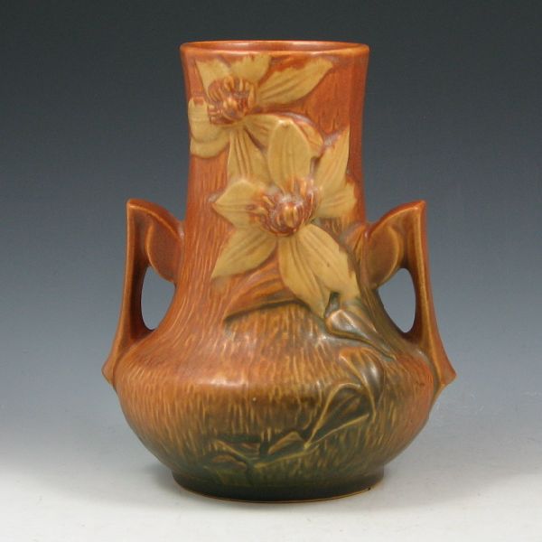 Appraisal: Roseville Clematis handled vase in brown Marked Roseville USA -