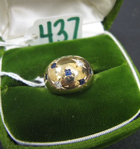 Appraisal: SAPPHIRE DIAMOND AND FOURTEEN KARAT GOLD RING set with a