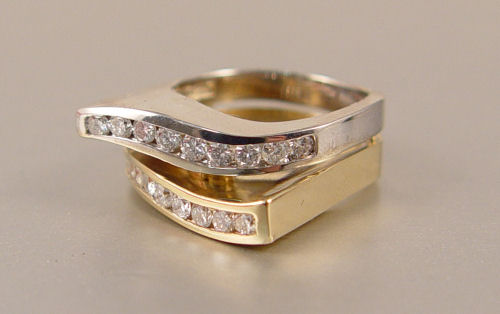 Appraisal: DESIGNER K TWO TONE DIAMOND RING K white and yellow