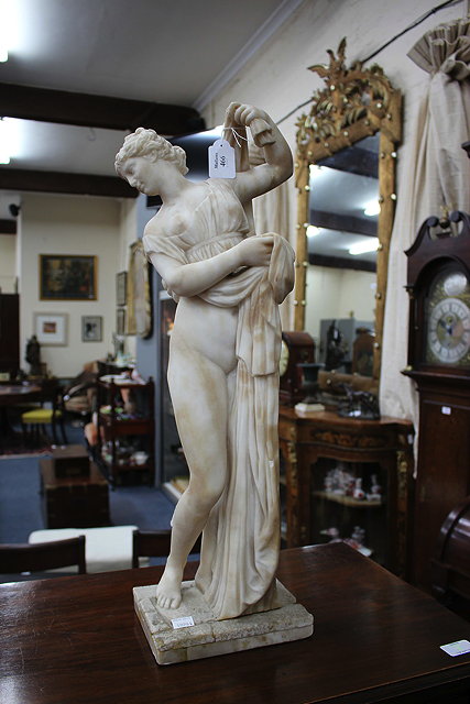 Appraisal: A LATE TH EARLY TH CENTURY CARVED ALABASTER FIGURE of