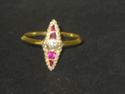 Appraisal: A RUBY AND DIAMOND RING of navette form set in