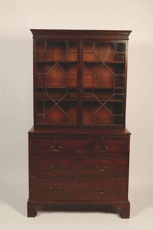 Appraisal: A GEORGE III MAHOGANY CABINET the upper section with a