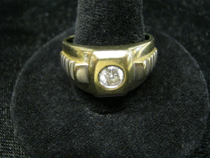 Appraisal: Gentleman's karat yellow gold and single diamond ringRound cut diamond