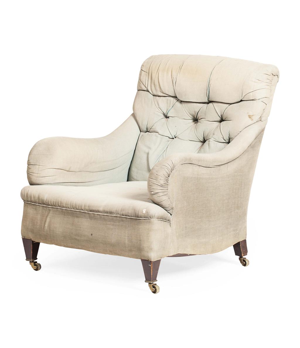 Appraisal: HOWARD SONS STYLE EASY ARMCHAIR LATE TH CENTURY the button