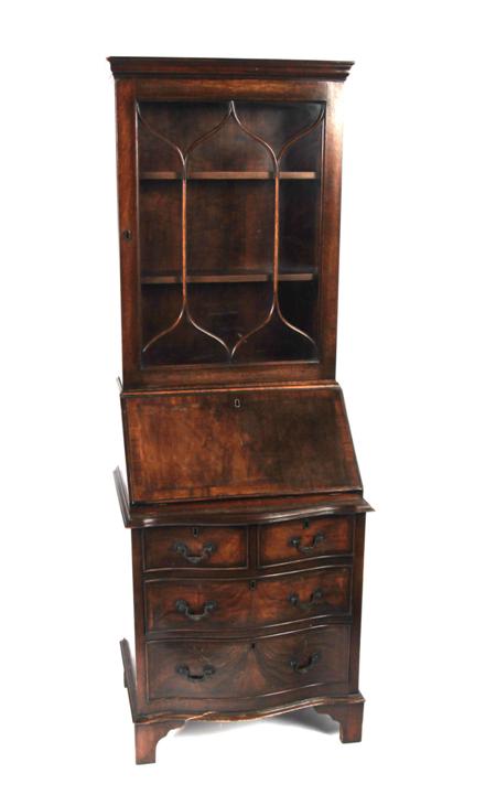 Appraisal: An th century style slim walnut bureau bookcase the projected