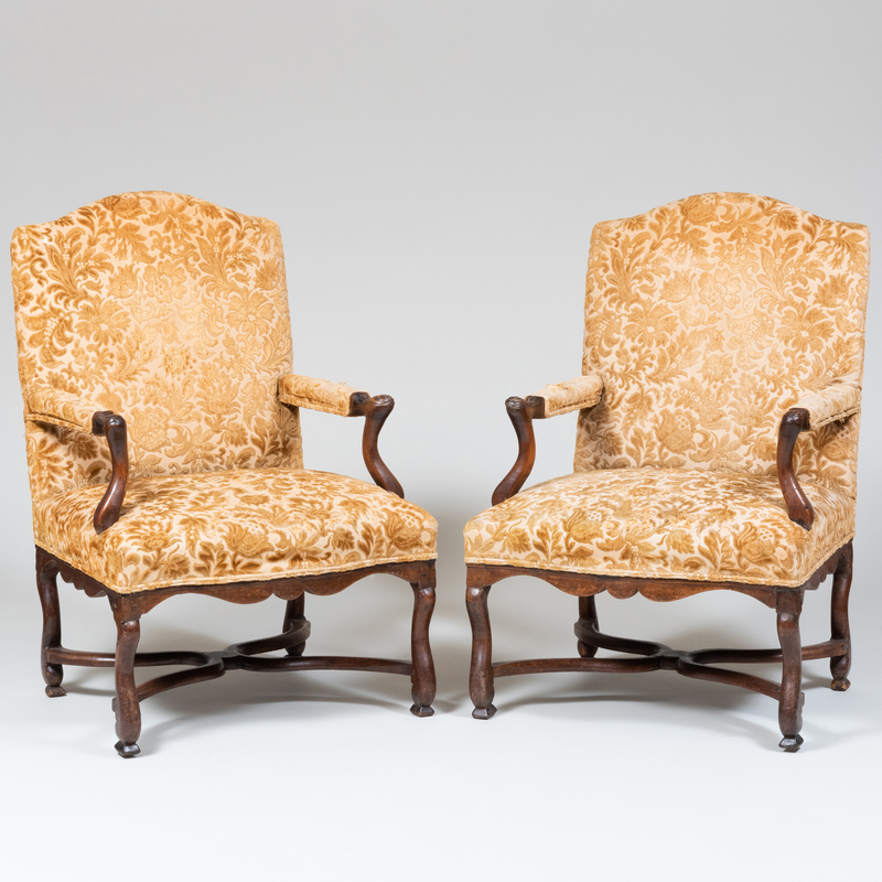 Appraisal: Pair of R gence Style Provincial Walnut Fauteuils la Reine