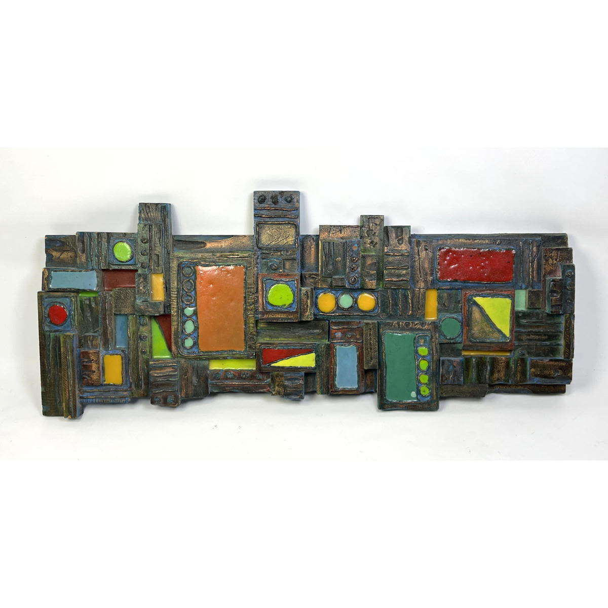 Appraisal: Zucco abstract colorful wall sculpture Signed on back Paul Evans