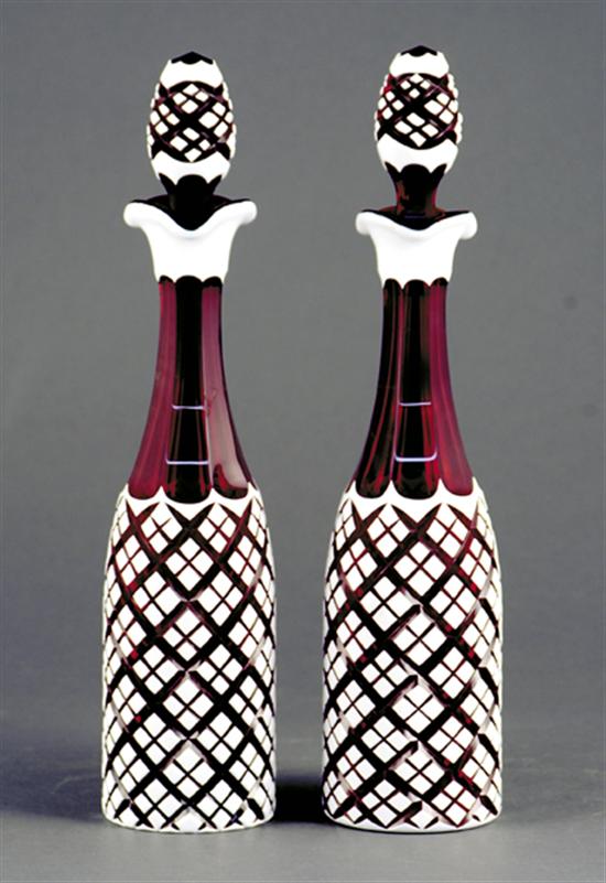 Appraisal: Pair cased glass decanters th centurywhite glass cut-to-ruby with pineapple