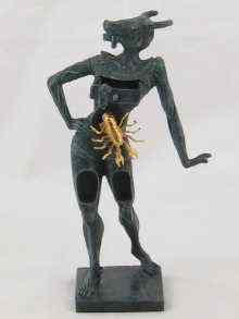 Appraisal: A bronze figure with animal head and magnetic gilt base