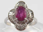 Appraisal: A white metal tests carat gold ruby and diamond ring