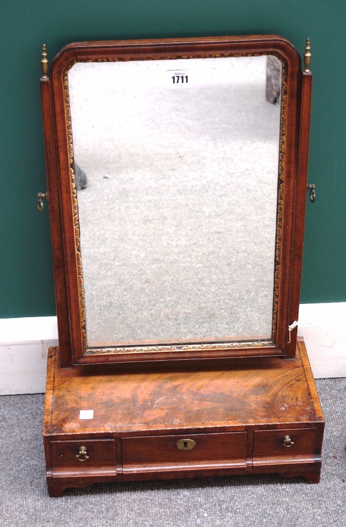 Appraisal: An th century parcel gilt figured walnut toilet mirror with