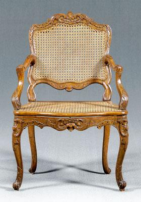 Appraisal: Louis XV carved beechwood fauteuil cane back and seat shell