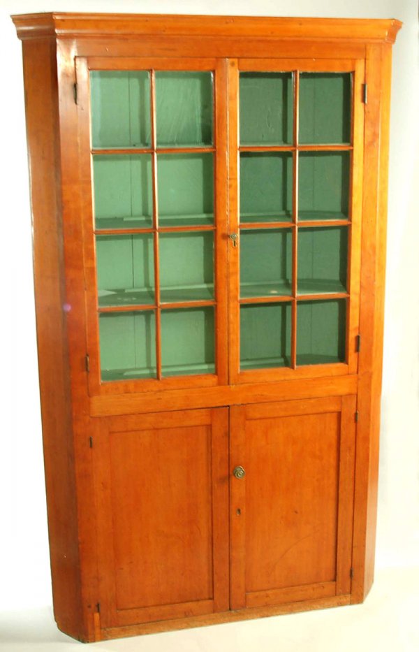 Appraisal: A softwood double door one-piece built-in corner cupboard south central