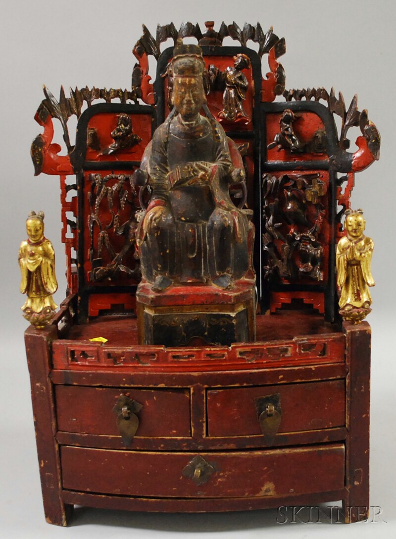 Appraisal: Chinese Shrine China th th century comprising a central figure