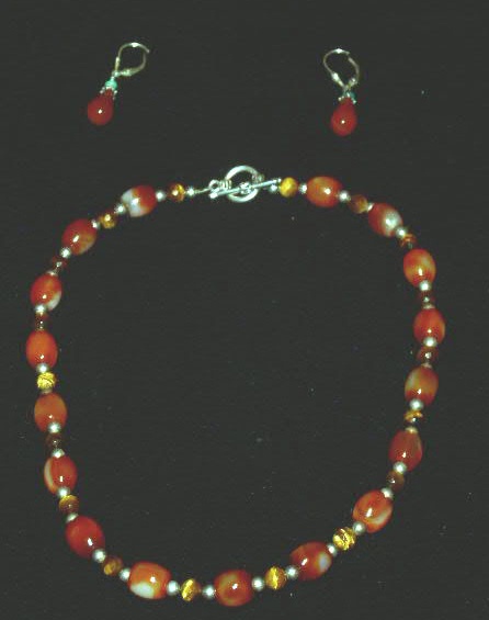 Appraisal: Ladies sterling silver necklace l with cat s-eye and carnelian