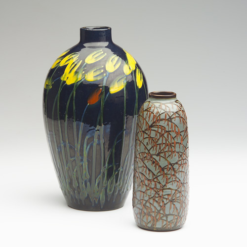 Appraisal: MAX LAUGER Two vases with slip decoration one with yellow