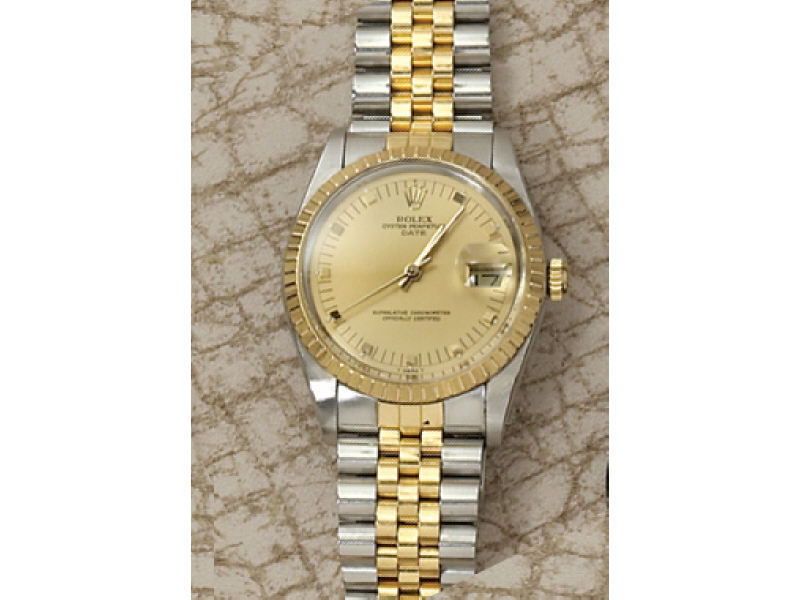 Appraisal: ROLEX STEEL AND GOLD MAN'S WATCH Stainless oyster perpetual date