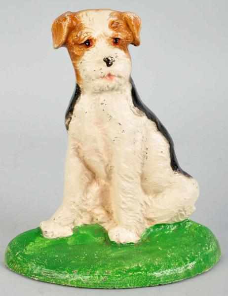 Appraisal: Cast Iron Sitting Fox Terrier Doorstop Hubley cat Numbered Condition