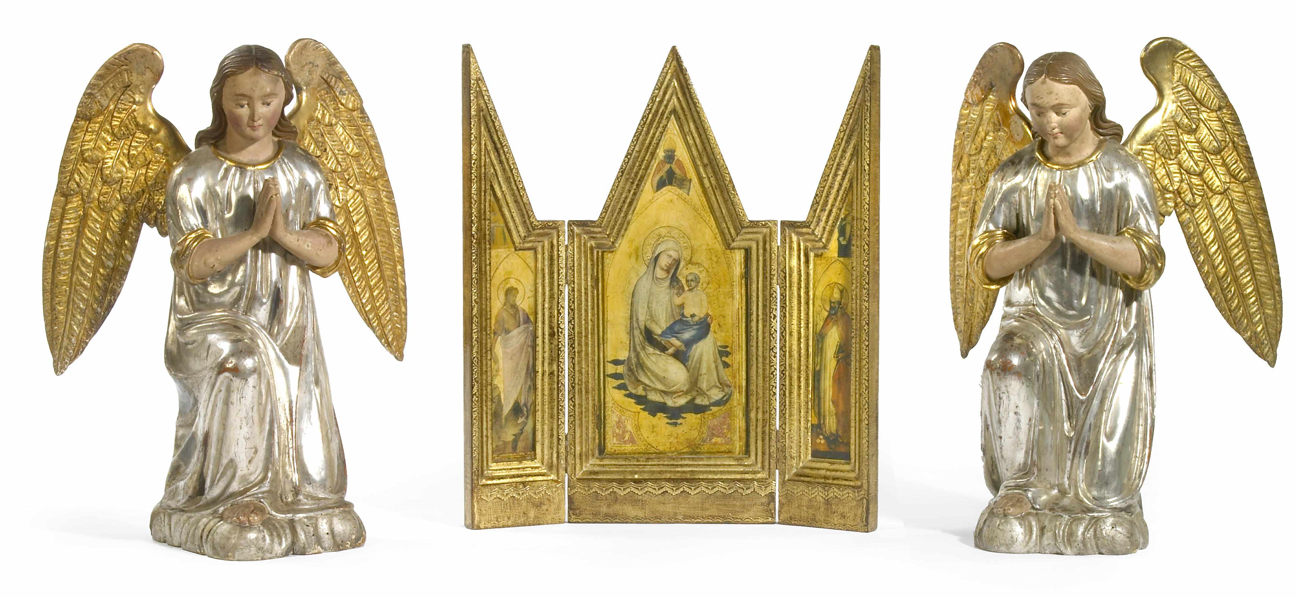 Appraisal: A pair of Continental silver and giltwood figures of kneeling