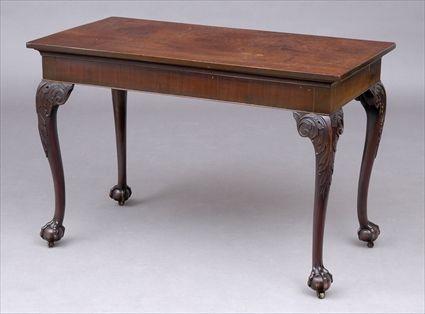 Appraisal: GEORGE III MAHOGANY CENTER TABLE The rectangular top above a