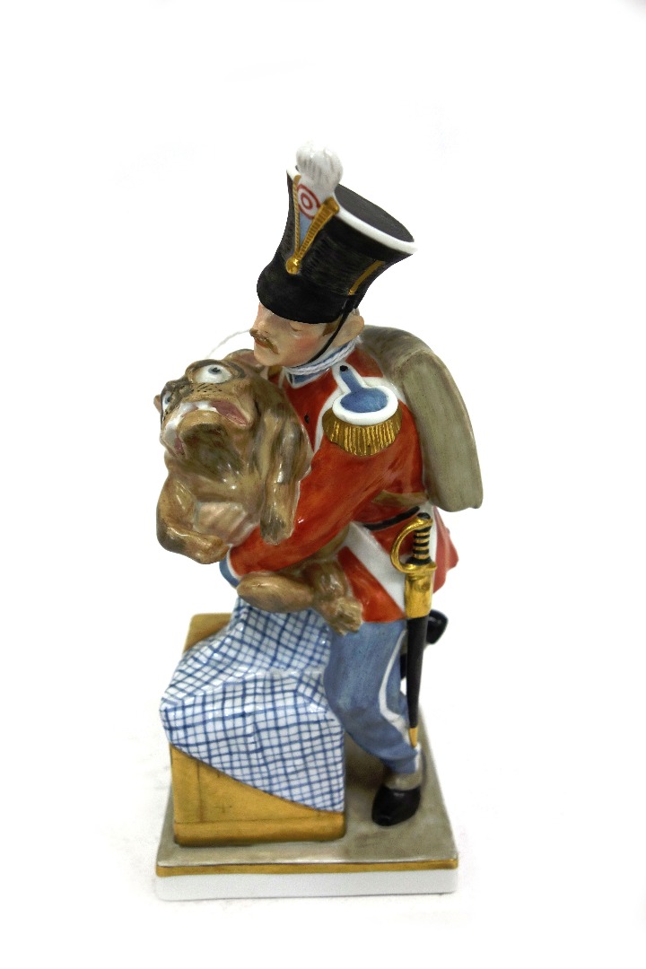 Appraisal: A Royal Copenhagen figure Hussar holding Griffon dog model number