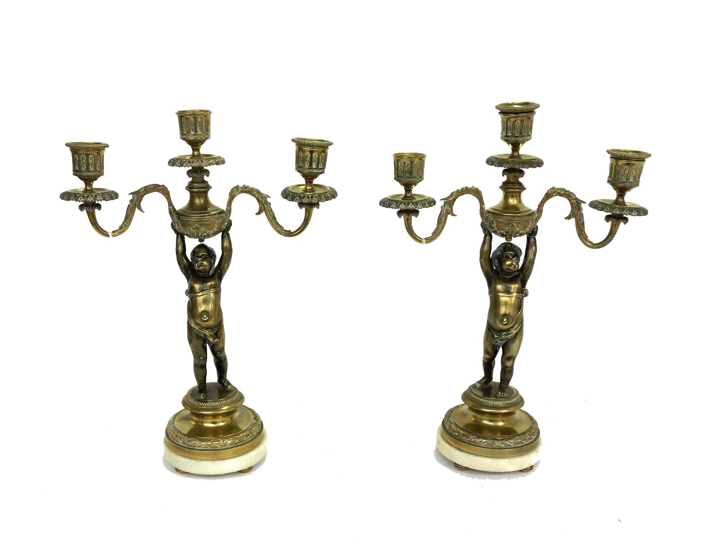 Appraisal: A pair of Victorian brass and marble mounted three branch