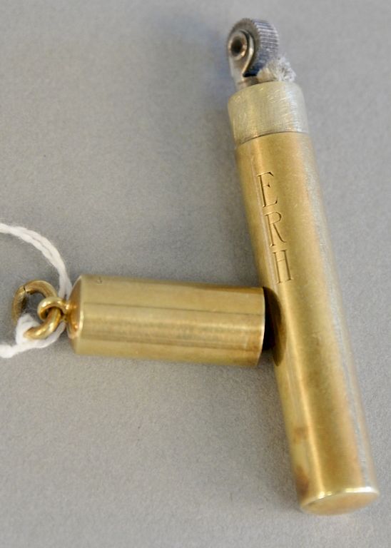 Appraisal: Cartier K gold lighter having cylindrical case with a bail