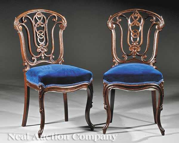 Appraisal: A Pair of American Rococo Carved Rosewood Side Chairs mid-