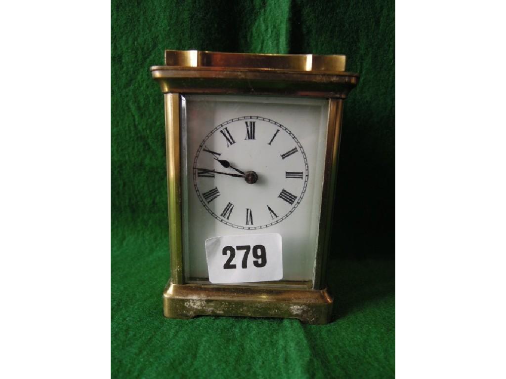 Appraisal: A simple brass carriage clock with eight day movement