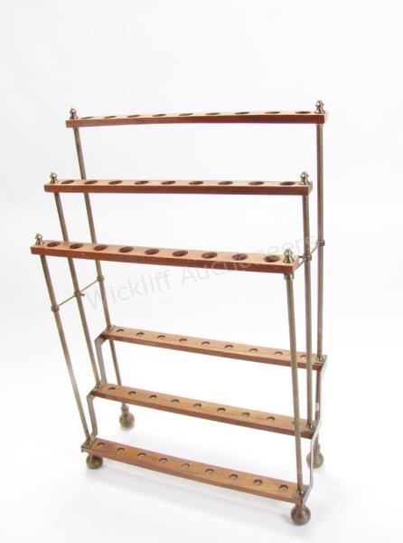 Appraisal: Brass and Wood Cane Stand three tier stand holds canes