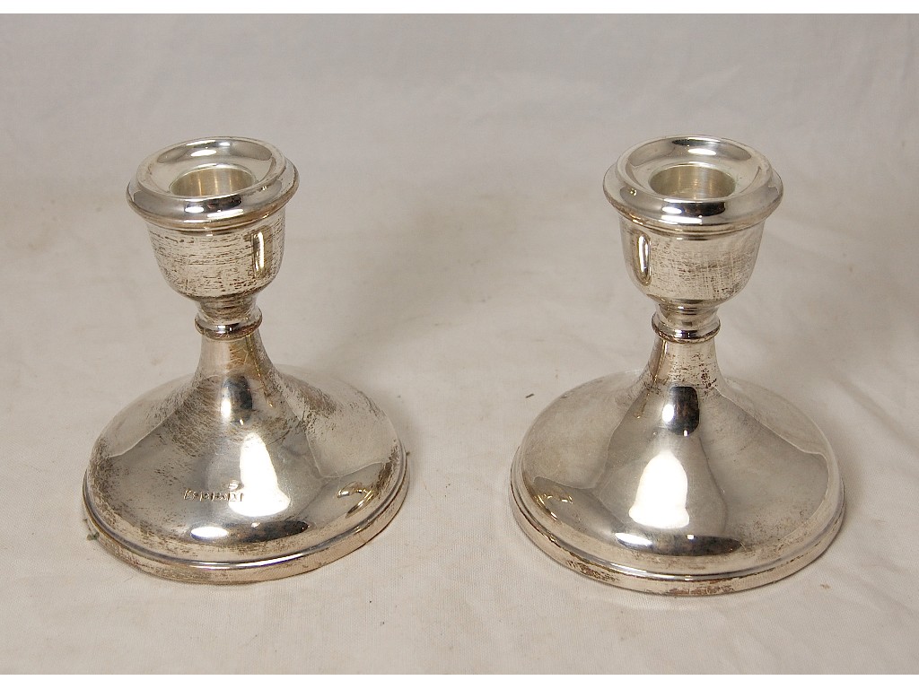 Appraisal: Pair of modern silver circular loaded candlesticks cm high Birmingham