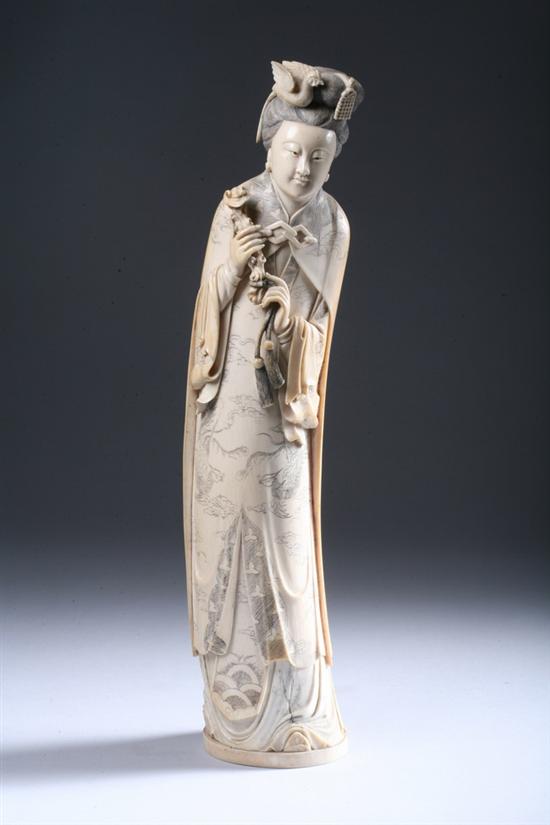 Appraisal: CHINESE IVORY FIGURE OF GUANYIN Qianlong seal mark late Qing