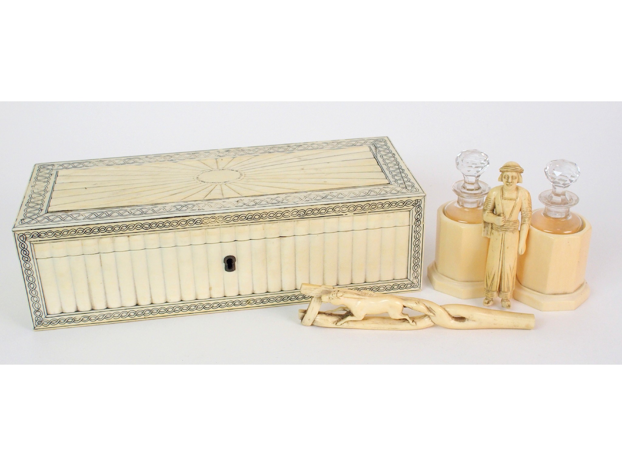 Appraisal: An Anglo-Indian ivory rectangular boxwith fluted sides and entwined geometric