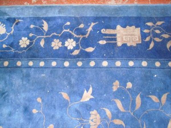 Appraisal: A Chinese carpet circa the blue ground with a medallion