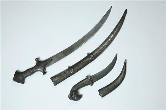 Appraisal: TWO DAGGERS India early th century Engraved scabbards and handles