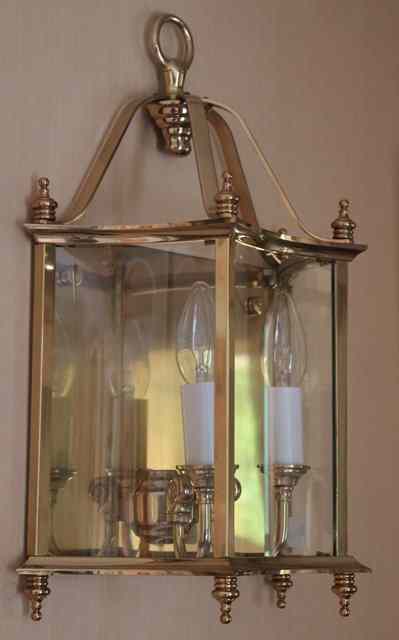 Appraisal: A SET OF FOUR BRASS WALL MOUNTED TWO LIGHT THREE