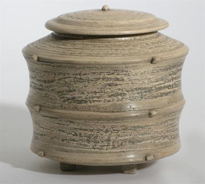 Appraisal: A waxed earthenware lidded vessel by Jason Wason with applied