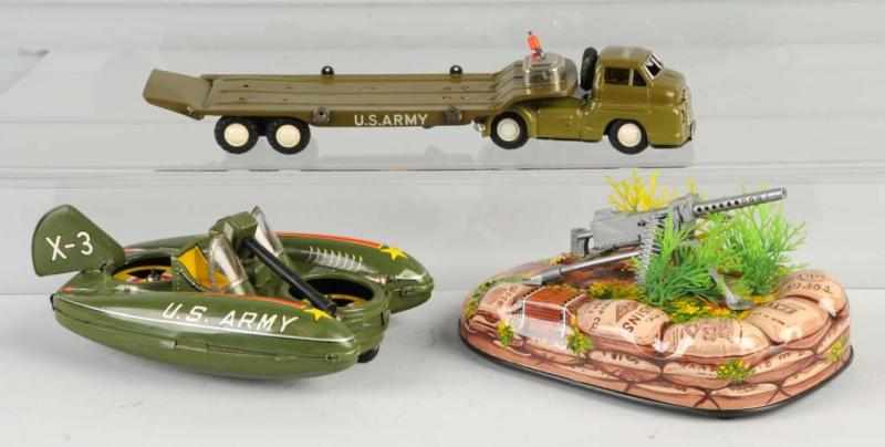 Appraisal: Lot of Vintage Military Toys Description Japanese Includes one US