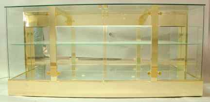 Appraisal: CONTEMPORARY BRASS AND PLATEGLASS DISPLAY CABINET the glazed cabinet with