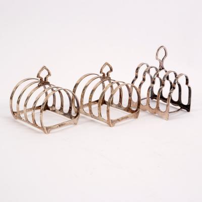 Appraisal: A pair of silver five-bar toast racks Mappin Webb Sheffield