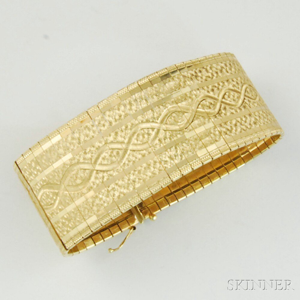 Appraisal: kt Gold Bracelet Italy the wide strap with engraved detail