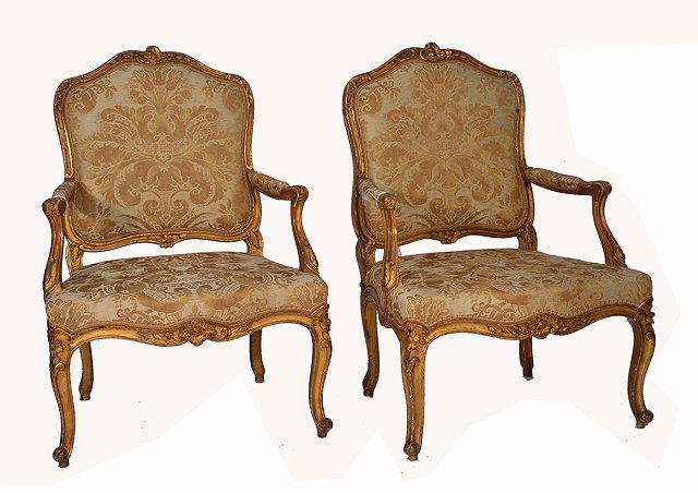 Appraisal: A PAIR OF LOUIS XV STYLE GILT WOOD FAUTEUILS with