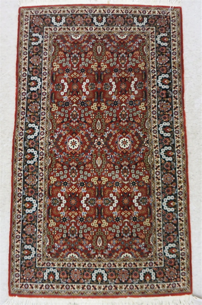 Appraisal: HAND KNOTTED ORIENTAL AREA RUG Indo-Persian overall floral design on