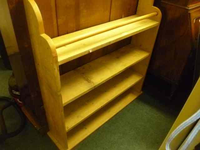 Appraisal: A STRIPPED PINE FOUR TIER RACK of simple form wide