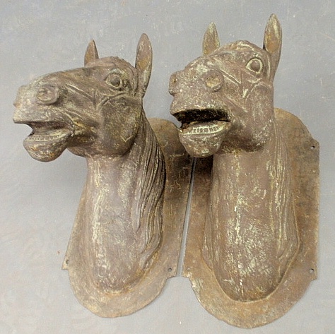 Appraisal: - Life-size pair of th c cast iron horse heads