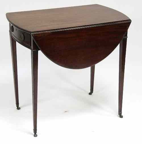 Appraisal: A George III mahogany oval Pembroke table fitted a single