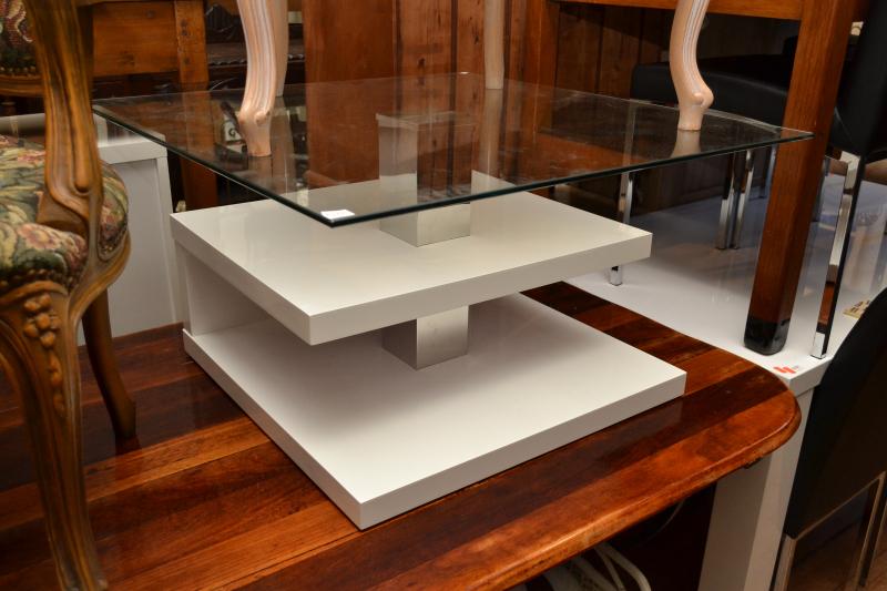 Appraisal: A CONTEMPORARY WHITE THREE TIER COFFEE TABLE A CONTEMPORARY WHITE