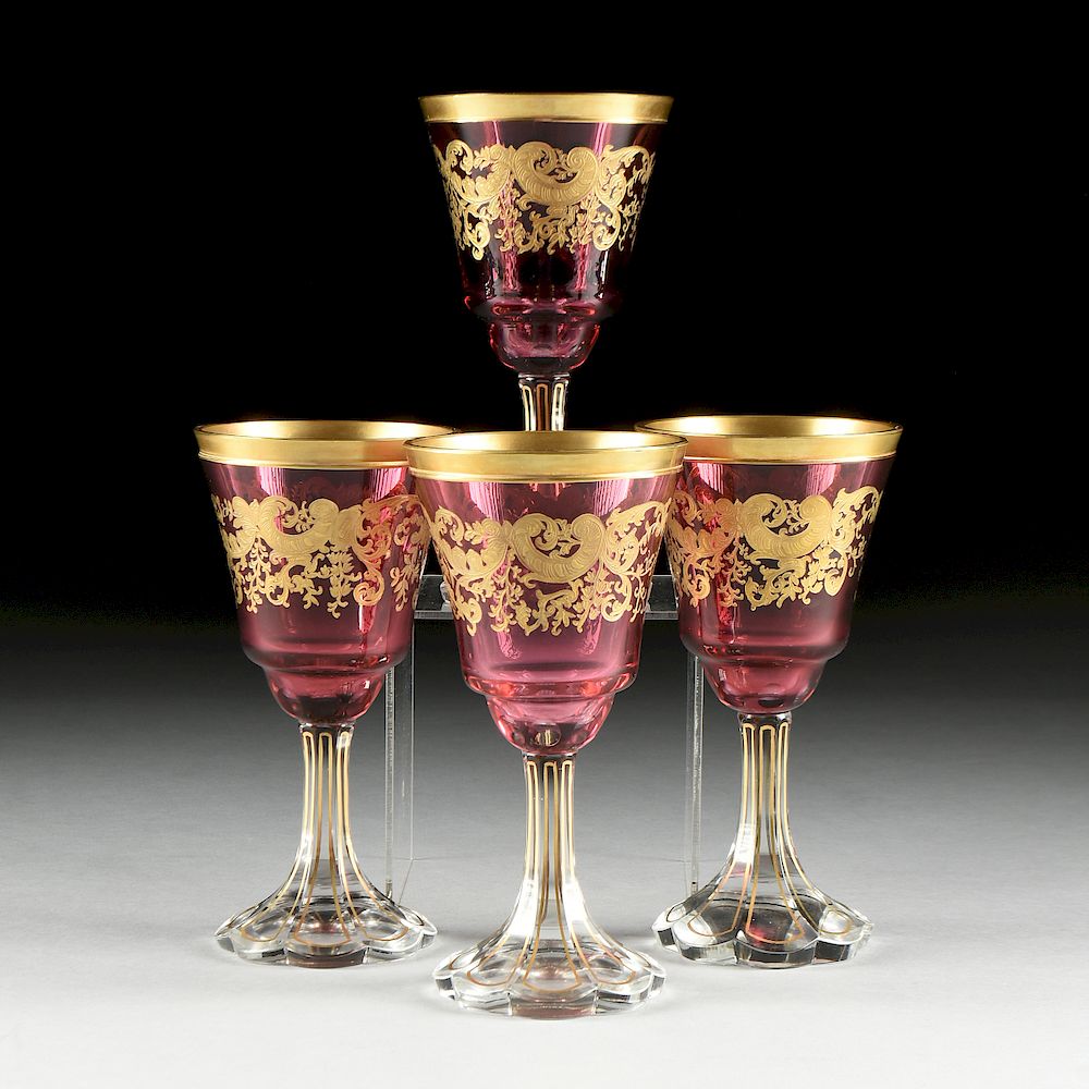 Appraisal: A SET OF FOUR BACCARAT STYLE GILT OVERLAY CRANBERRY TO